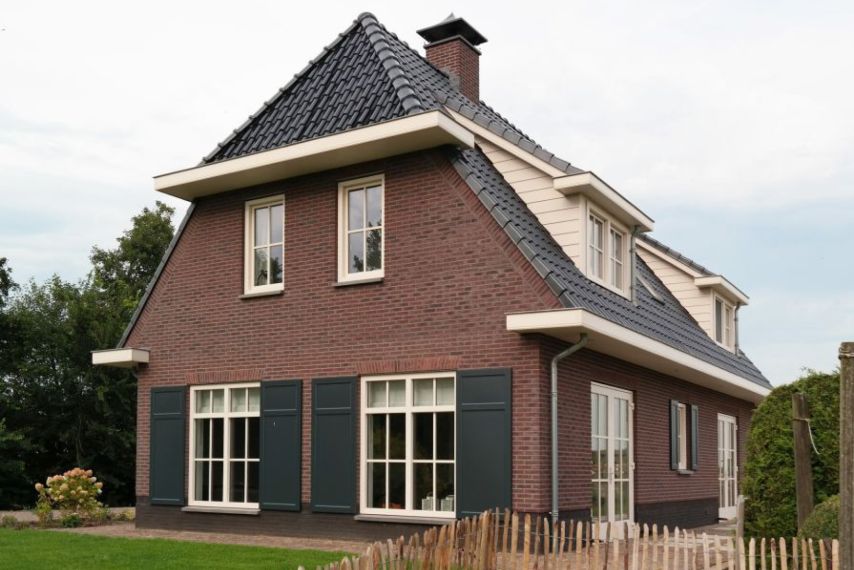 Landelijke woning in oude stijl in Baarn gebouwd door Wens&Co